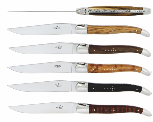Six couteaux, manches en différents bois durs, polis, Tradition - Forge de Laguiole